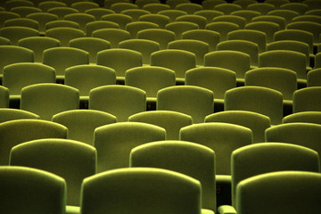Green velvet seat in a theater