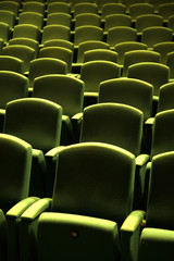 Green velvet seat in a theater