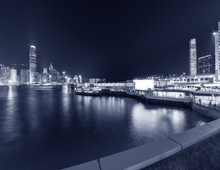 Panorama of Victoria harbor of Hong Kong city at night