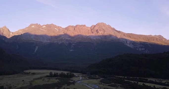 Drone shot at Glenorchy - New Zealand. Great mountains and green fields in the middle of nowhere.