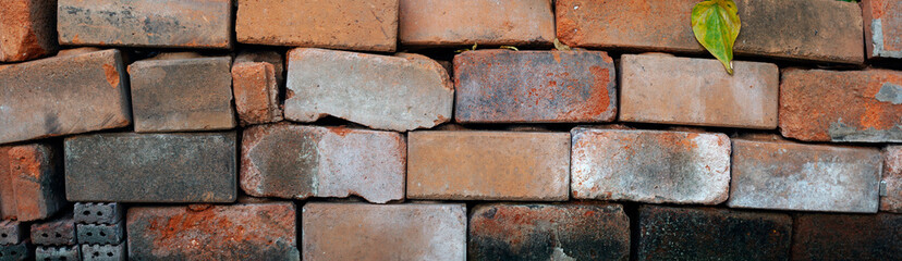 wall of red-brown bricks