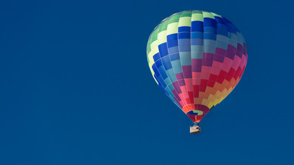 classic blue sky with colorful balloon