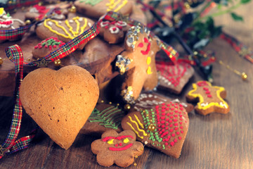 Home made Christmas cookies as a gift for family and friends on wooden table