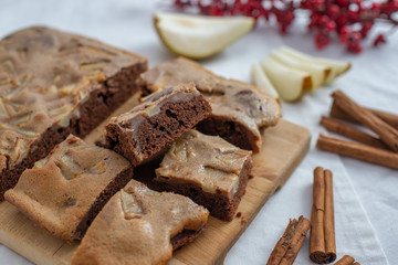Fototapeta na wymiar Christmas Brownies with cinnamon and pears