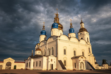 Fototapeta na wymiar The view of five-domed St Sophia-Assumption Cathedral and the round corner tower of Seating courtyard in Tobolsk Kremlin. Tobolsk. Tyumen Oblast. Russia