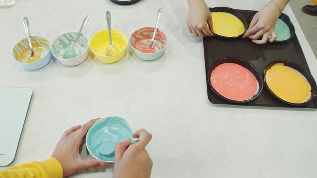 Mixing food colour into cake mix