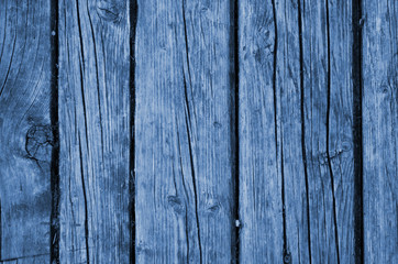The blue wood texture with natural patterns. Classic Blue color. Color of the year 2020. Trendy color.