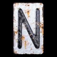 3D render capital letter N made of forged metal on the background fragment of a metal surface with cracked rust.