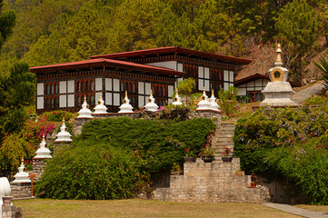 Fototapeta na wymiar Small stupas in Khamsum Yulley Namgyal Chortenm, Punakha District, Bhutan