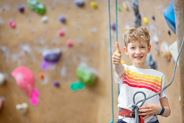 boy at rock climbing gym