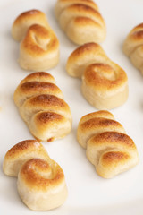 Close up of Figuritas de mazapan, Spanish marzipan on white  background.