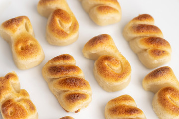 Close up of Figuritas de mazapan, Spanish marzipan on white  background.