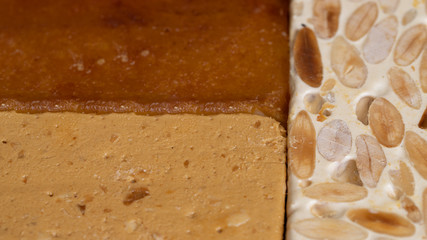 Three type of turron texture, hard almond, soft almond and burnt egg yolk nougat. Traditional Christmas sweet.