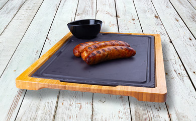 Smoked pork sausages with mustard.