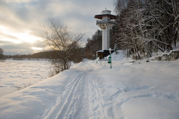Shore elevator to the river on a cold winter evening