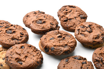 Tasty cookies with chocolate chips on white background