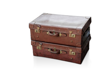 Di cut antique brown leather bags stacked on white background, vintage, object, copy space