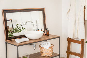 Fototapeta na wymiar Interior of clean bathroom with sink near white wall