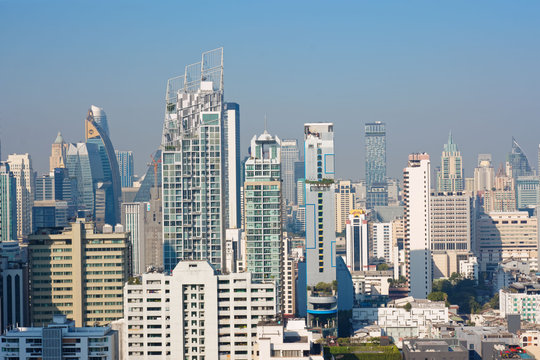 Bangkok, Thailand &ndash; December 21, 2019 : Office Buildings, city and condominiums Area in Bangkok, Office Building in City, Modern Building, Businesses Building. Sky view from Asoke area. with blue sky.