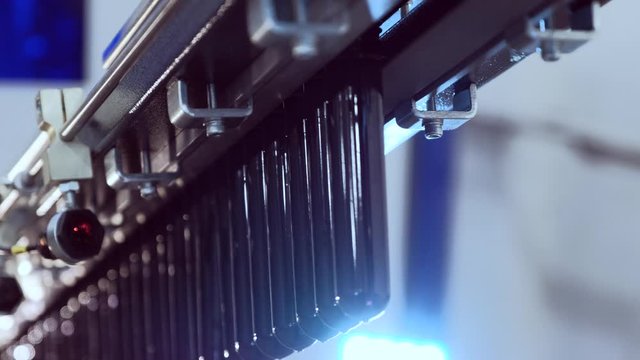 The preform conveyor. Fragment of conveyor line, blowing plastic bottles from PET preform blanks