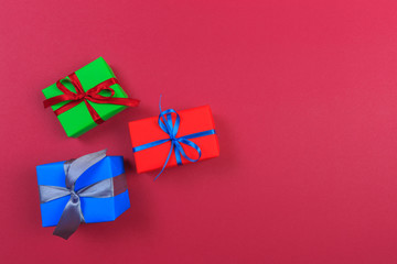 Different colored gift box on color background. Top view of various present boxes on minimal background. Birthday, Christmas, wedding, valentine, romantic gifts - Image