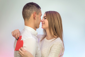 St. Valentine's day. Boyfriend making surprise to his girl in love