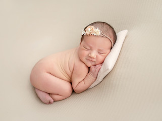 Naked innocent newborn