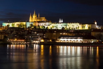 Obraz na płótnie Canvas Night View of colorful old town and Prague castle with river Vltava, Czech Republic