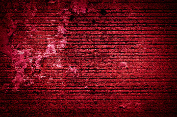 Wall grunge dark red ,maroon concrete with light background. Dirty wall concrete blackboard texture and splash or abstract background. Image vintage style.