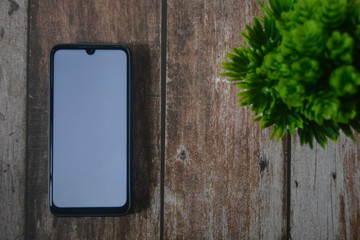 blank sign smartphone on the taboe