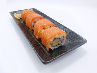 Japanese food style, Top view of salmon roll isolated on white background, Ready to eat or serve