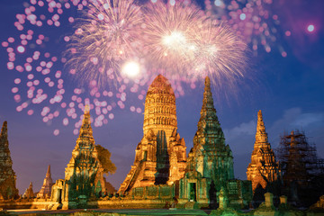 Fototapeta premium Beautiful Buddhist temple at night with fireworks for celebrations.