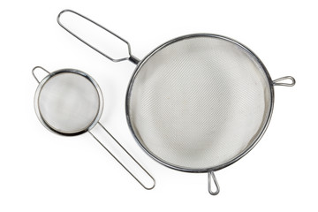 Top view of two round stainless steel sieve different sizes - obrazy, fototapety, plakaty