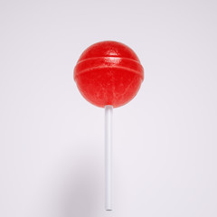 Lollipop on a stick isolated on white background. Round candy of red color. 3d rendering