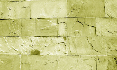 Sand stone wall in yellow tone.