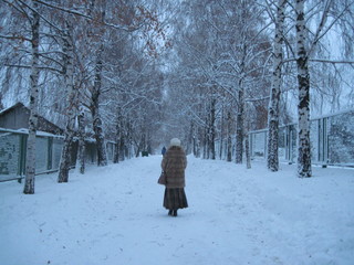 woman walking in winter park