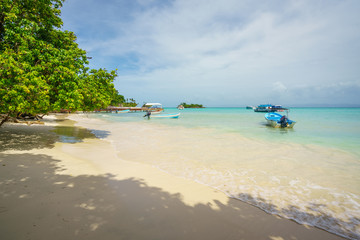 Cayo Levantado  nickname Bacardi island, Small port with tourist ships and fishing boats moored,Samana peninsula,Dominican republic