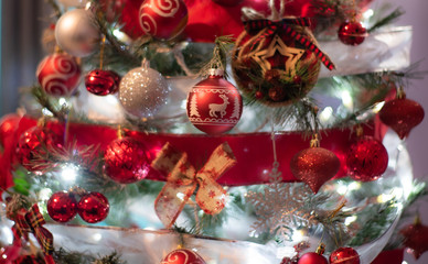 christmas balls and decorations on red background