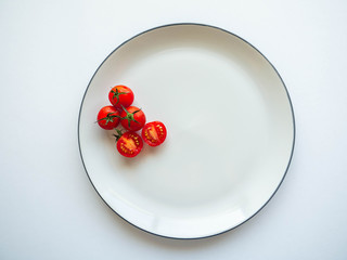 Red tomatoes Put on dish White,Food for healthy,white background