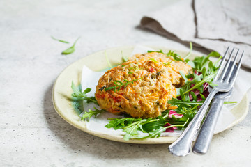 Vegetable cutlets with arugula salad. Vegan food concept.