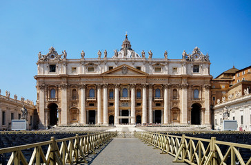 Fototapeta na wymiar Photo of St. Peter's Basilica in Vatican City, view from St. Peter's Square, Rome, Italy