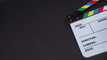Clapperboard or clap board or movie slate .It is use in video production ,film, cinema industry on black background.