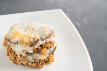 moussaka, eggplant of aubergine. In black background