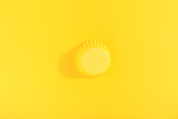 Yellow cap on yellow background. Picture creative. Creative idea. Minimal concept.