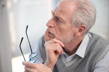 Pensive senior businessman