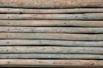 Horizontal bamboo poles.