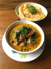 Traditional Thai Food on A Teak Table