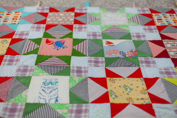 Patchwork, sewing with pieces of fabric, multi-colored segments.