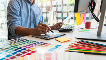 Professional Creative architect graphic desiner occupation choosing the Color pantone palette...