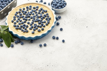 Fototapeta na wymiar Blueberry pie or tart with fresh berries